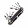 A multifunction bicycle tool mid-expand Royalty Free Stock Photo