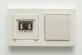 Multifunction outlet with an white electrical light switch with USB ports Royalty Free Stock Photo