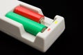 Multifunctional cylindrical batteries charger Royalty Free Stock Photo