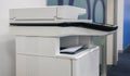 Multifunctional office printer for in scanning printing documents at workplace