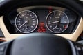 Multifunctional panel of luxury car with speedometer tachometer indicators Royalty Free Stock Photo