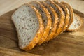 Multigrain bread. Fresh bakery. Slices of multigrain bread on a cutting board. Close-up. Royalty Free Stock Photo