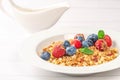 Multigrain breakfast with seeds, dried and fresh berries