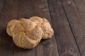 Multigrain Kaiser rolls on wooden background