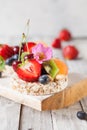 Multigrain rice cakes with berries, fruit and almond for healthy Royalty Free Stock Photo