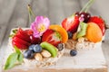 Multigrain rice cakes with berries, fruit and almond for healthy Royalty Free Stock Photo