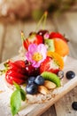 Multigrain rice cakes with berries, fruit and almond for healthy Royalty Free Stock Photo