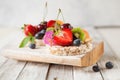 Multigrain rice cakes with berries, fruit and almond for healthy Royalty Free Stock Photo