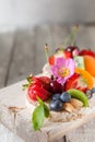 Multigrain rice cakes with berries, fruit and almond for healthy Royalty Free Stock Photo