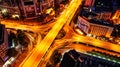 Multilevel intersection in one of the city districts in the evening illumination, Wuhan