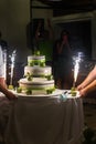Multilevel wedding cake decorated with green apples Royalty Free Stock Photo