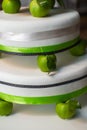 Multilevel wedding cake decorated with green apples Royalty Free Stock Photo