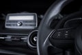 Multimedia button on multifunction steering wheel. Royalty Free Stock Photo