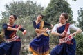 Multinational group of beautiful young classical odissi dancers wears traditional costume and posing Odissi dance mudra in the