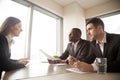 Young woman talking with employers on interview Royalty Free Stock Photo