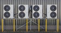 Multiple Air Conditioner Units on Building Exterior for Efficient Cooling Royalty Free Stock Photo