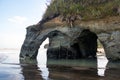 Multiple arch like rock formation at Tongaporutu Three Sisters rocks, New Zealand Royalty Free Stock Photo