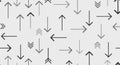 Multiple black and gray arrows are arranged in various directions on a white backgro Royalty Free Stock Photo