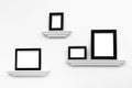Multiple Blank picture frames on Ledges on a wall Royalty Free Stock Photo