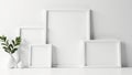 Multiple blank white picture frames of varying sizes against a stark white backdrop , various, isolated, white background Royalty Free Stock Photo