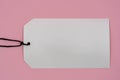 Multiple blank white tag price on pink background