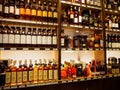 Multiple bottles of Cognac and Amarginac, Paris, France Royalty Free Stock Photo