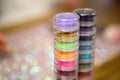 multiple boxes of glitter makeup artist face Royalty Free Stock Photo