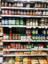 Multiple Brands of Parmesan Cheese for Sale at a Grocery Store