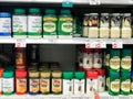 Multiple Brands of Parmesan Cheese for Sale at a Grocery Store