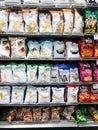 Multiple Brands of Potato Chips for Sale at a Grocery Store