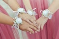 Bridesmaid closeup hands with bows Royalty Free Stock Photo