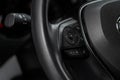 Multiple buttons on the steering wheel to accept or reject calls from the phone close up view. Royalty Free Stock Photo