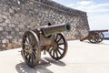 Multiple cannons the old fortress Castillo de San Gabriel, off the coast from Arrecife, Lanzarote, Spain