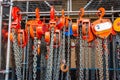 Multiple chain hoists hanging in a rack Royalty Free Stock Photo