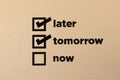 Multiple Choice On Wall With "later" "tomorrow" Ticked