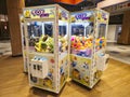 Multiple Claw Machines Lined Up Inside an Amusement Park Royalty Free Stock Photo