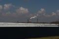 Multiple Coal Fossil Fuel Power Plant Smokestacks Emit Carbon Di