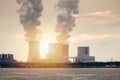 Multiple Coal Fossil Fuel Power Plant Smokestacks Emit Carbon Di