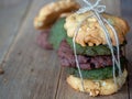 Multiple color cookies inclusive peanut butter, green tea cookies, and Chocolate Chip Cookies. Overlaid by alternating colors on w Royalty Free Stock Photo