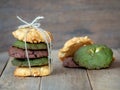 Multiple color cookies inclusive peanut butter, green tea cookies, and Chocolate Chip Cookies. Overlaid by alternating colors on w Royalty Free Stock Photo