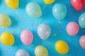 multiple colored balloons are on a blue background,