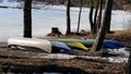 Multiple Colorful Kayaks and Canoes Parked on a Beach in Espoo during Spring