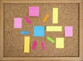 Multiple colorful paper posts, empty backdrop on cork board background, brainstorming concept Royalty Free Stock Photo