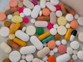 Multiple coloured Tablets and capsules in single image. Royalty Free Stock Photo