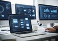 Multiple computer screens display data visualizations and Royalty Free Stock Photo