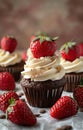 multiple cupcakes and strawberries sitting on top of strawberries