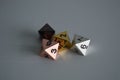 Multiple d8 eight sided dice die copper silver gold black Royalty Free Stock Photo