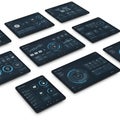 Multiple digital tablets display user interfaces featuring charts, maps, dials, and data Royalty Free Stock Photo
