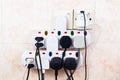 Multiple electricity plugs on adapter risk overloading and dange Royalty Free Stock Photo