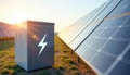 Multiple energy storage batteries aligned near solar panels with perspective depth and sunlight Royalty Free Stock Photo